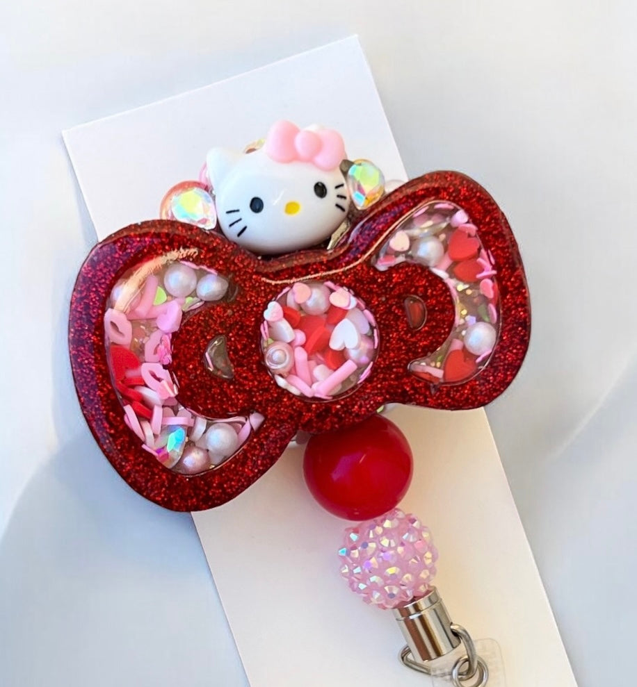 Shaker bow badge reel