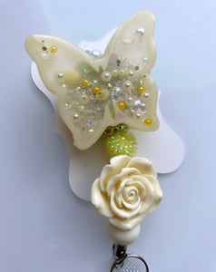 Yellow butterfly badge reel
