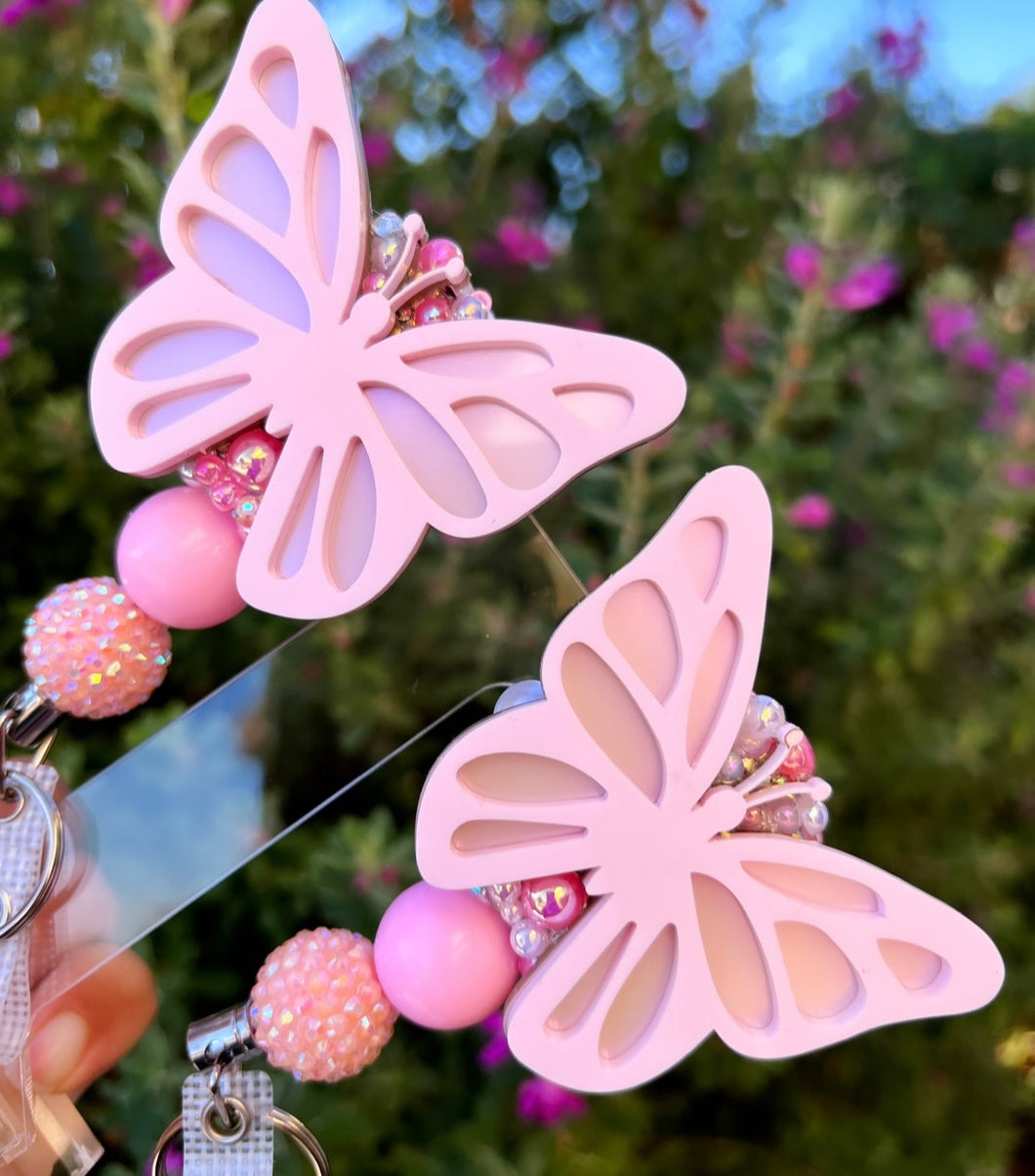 Butterfly badge reel