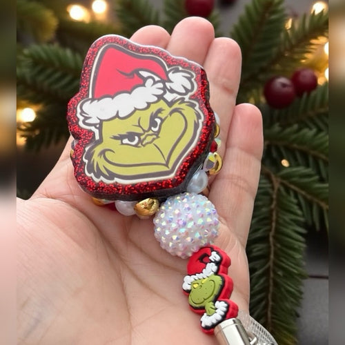 Grinch badge reel
