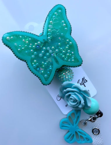 Butterfly badge reel