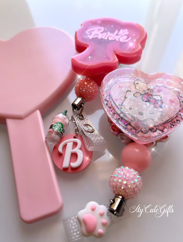Barbie shaker badge reel