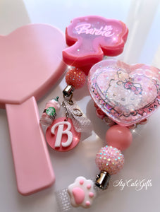 Barbie shaker badge reel