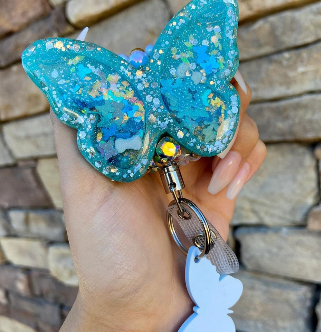 butterfly badge reel