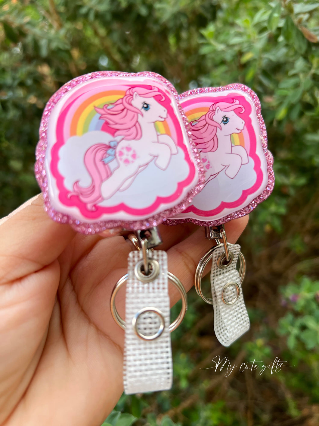 Pink pony badge reel