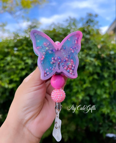 Butterfly badge reel