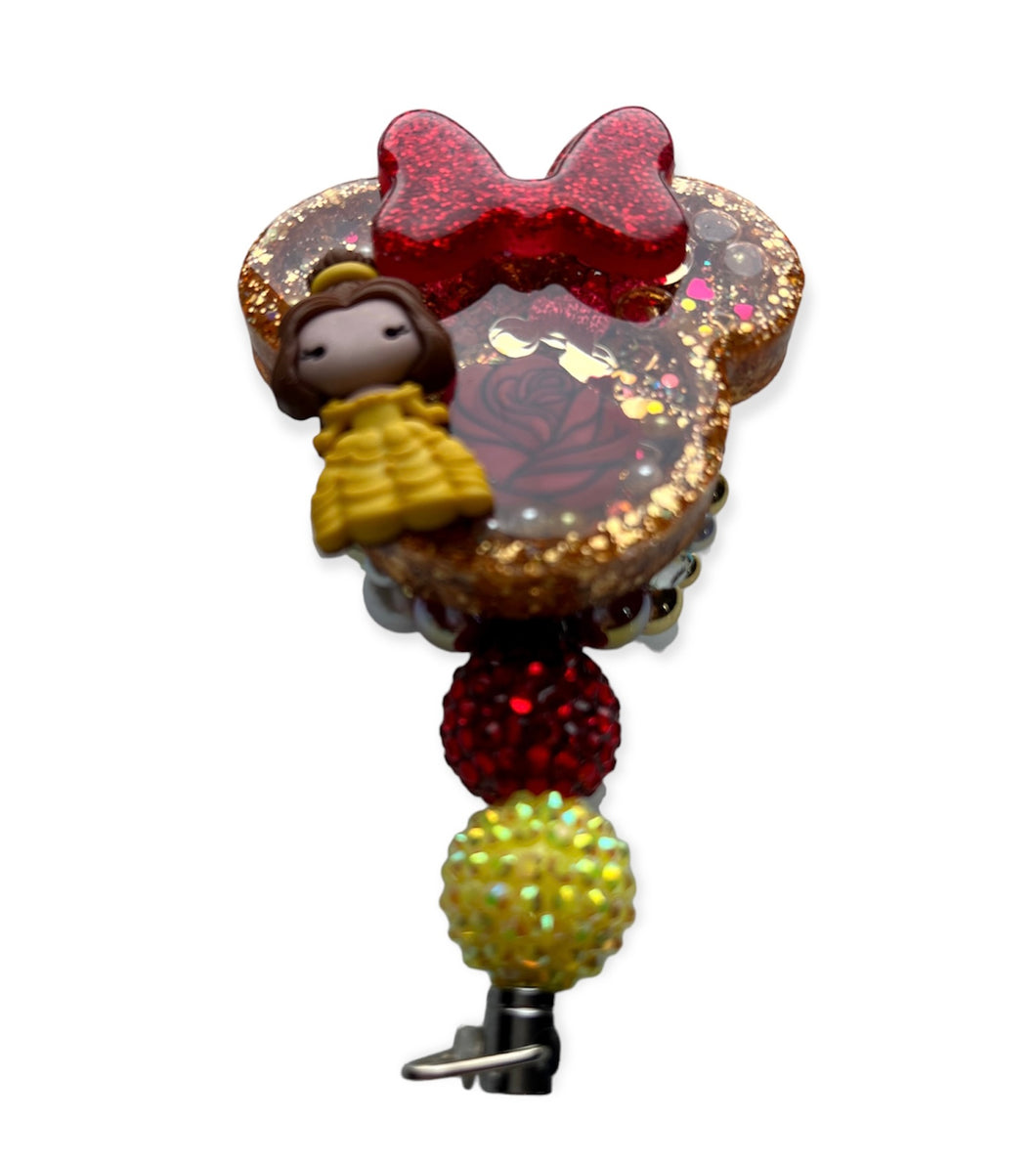 Badge reel shaker