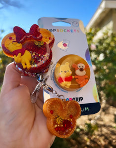 Pooh badge reel and phone grip