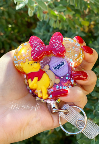 Large Pooh shaker badge reel