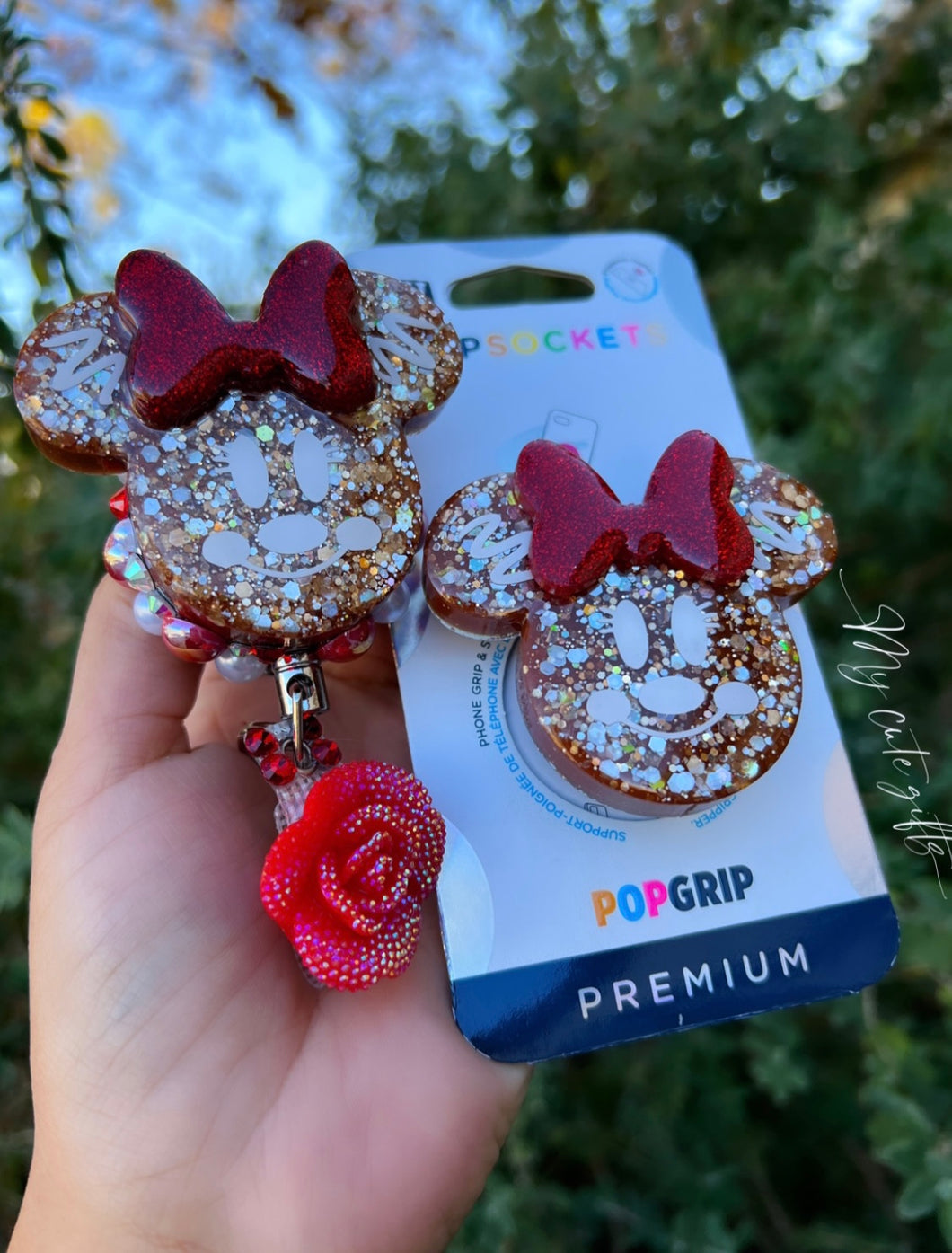 Badge reel and phone grip
