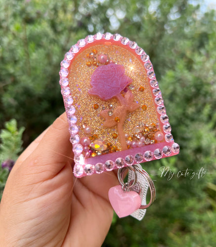 Enchanted rose shaker badge reel