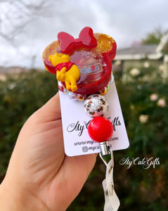 Pooh badge reel with bow