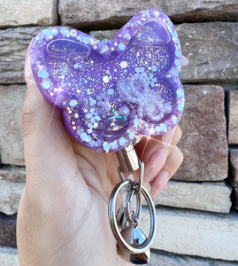Shaker butterfly badge reel