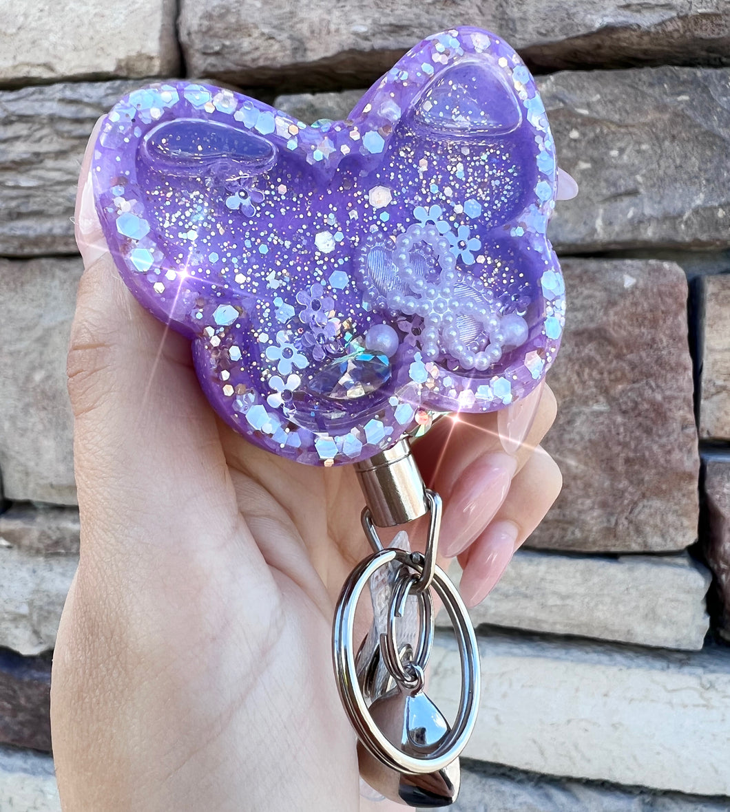 Shaker butterfly badge reel