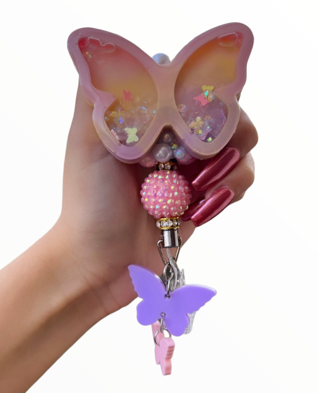 Butterfly shaker badge reel